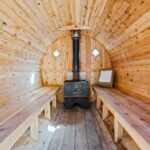 stove and benches in sauna
