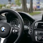 person driving bmw car